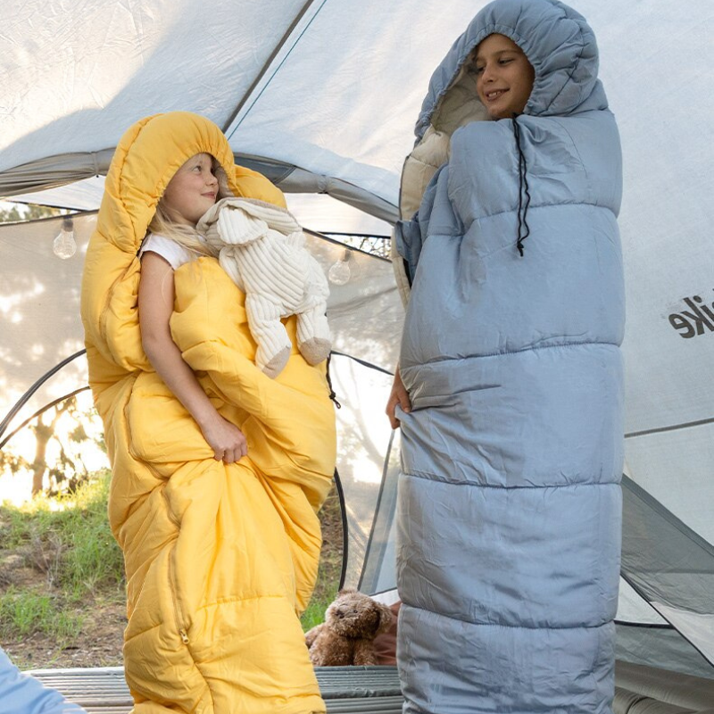 Naturehike dětský rostoucí spacák C180 1100g - žlutý